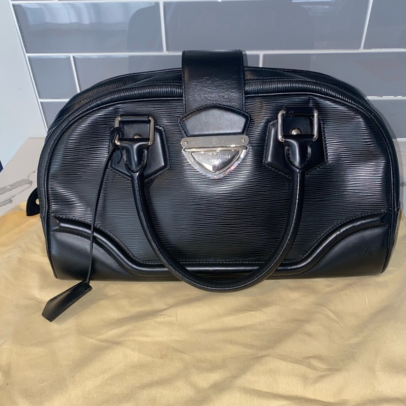 Louis Vuitton

Black Epi Leather Montaigne GM bag - Picture 1 of 7